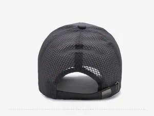 Detail view of breathable black mesh texture on baseball cap with adjustable metal buckle