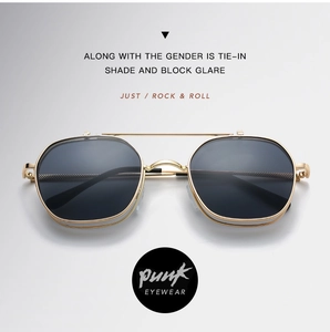 Macro detail of gold metallic punk sunglasses with retro double bridge and textured temple