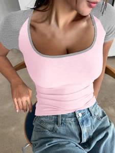 Detail of Y2K style slim fit U-neck short sleeve top in pink with gray contrast sleeves