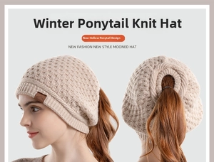 Detail view of waffle knit beanie showing functional ponytail hole and textured material