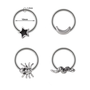 Silver stainless steel nose ring set featuring star, moon, spider and snake charms