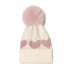 Winter knitted baby beanie with pink heart patterns and a large fluffy pom-pom