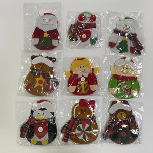 Detailed set of assorted Christmas felt cutlery holders including Santa and Reindeer figures