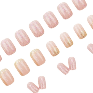 Elegant nude pink press-on nails with colorful glitter accents and gold french tips