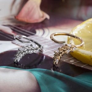 Olive branch leaf ring with zircon inlay in gold and silver finish with open design