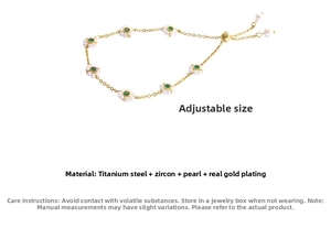 Detailed view of emerald flower bracelet with adjustable slider and gold titanium steel