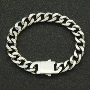 Men's chunky silver Cuban link bracelet in polished stainless steel for a punk biker look