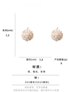 Detail view of cluster stud earrings with pearls and cubic zirconia on gold base