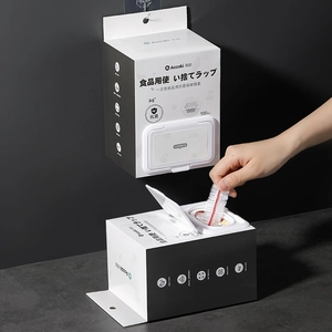 Pack of 100 disposable antimicrobial food covers being taken from the packaging box