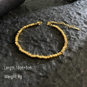 Detailed view of 18K gold plated titanium steel chain with lobster clasp and 5cm extension