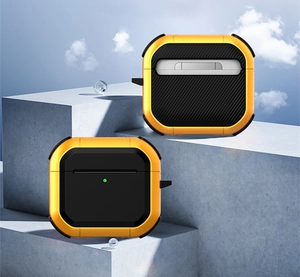 Coque AirPods robuste jaune et noire avec verrou de sécurité sur des blocs de béton