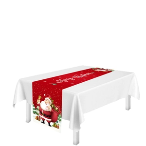 Red Christmas table runner featuring Santa Claus and Merry Christmas text on white table
