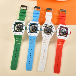 Tonneau skeleton mechanical watches with colorful silicone straps shown from a front angle