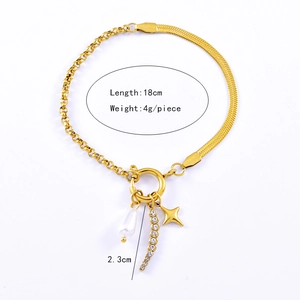 Detail view of gold AB chain bracelet with pearl, rhinestone bar, and star charm details