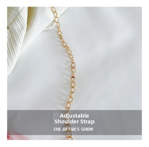 Detail shot of the adjustable golden link chain strap for women's heart mini jelly handbags