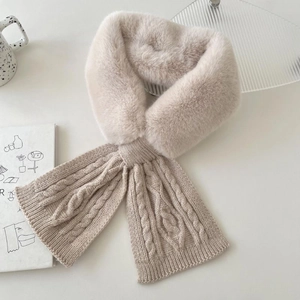 Detail of cable knit texture and soft faux fur collar on oatmeal winter scarf