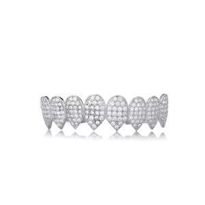 Macro detail of silver-tone iced out 8-tooth hip hop grillz with sparkling clear stones