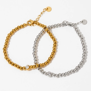 Beaded stainless steel jewelry set featuring gold and silver bracelets with zircon