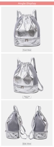 Detail view of pearlescent silver drawstring bag with gray mesh splicing and bottom compartment