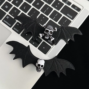 Gothic bat wing hair clips with skull accents for Halloween hair styling