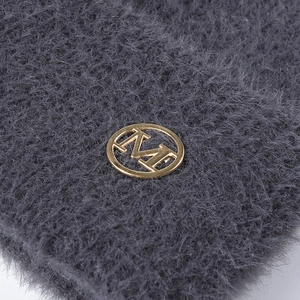 Winter plush knit beanie in dark gray featuring a premium golden MH metal logo plate