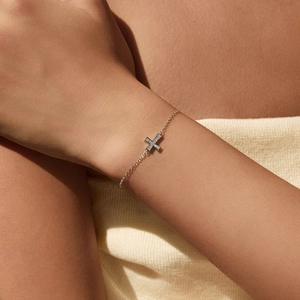 Minimalist S925 sterling silver cross bracelet with shimmering cubic zirconia for women