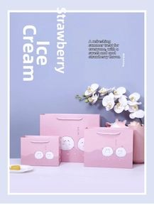 Dreiteiliges Set rosa Cartoon-Geschenktüten mit weißen Kordelgriffen in verschiedenen Größen