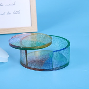 Macro view of holographic resin coaster storage box with rainbow glitter gradient finish