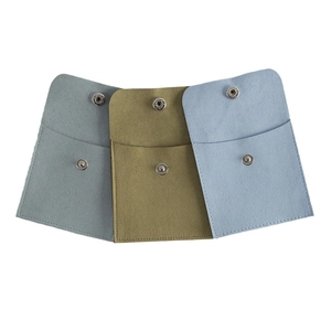 Three premium rectangular suede jewelry pouches in blue and green with silver snap buttons