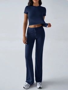 Detail view of navy blue two-piece lounge set with drawstring waist pants and soft fabric