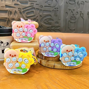 Cute mini bear whack-a-mole game keychains in multiple vibrant colors for bag decor.