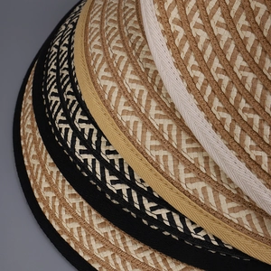 Women's woven sun hat with wide brim in beige, yellow, and black edge detailing