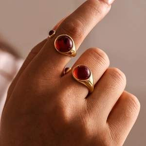 Luxurious PVD gold plated stainless steel open rings with round red garnet stones