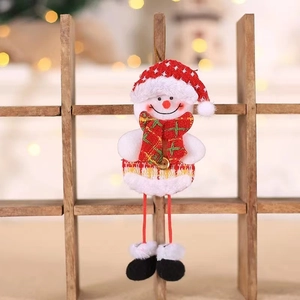 Poupée de bonhomme de neige de Noël avec bonnet rouge à étoiles pour décorer le sapin