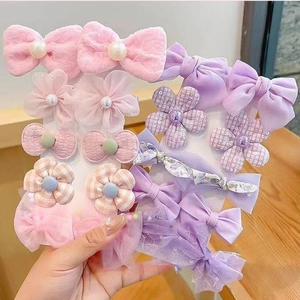 14-piece set of pink and purple floral bow hair clips and accessories for girls