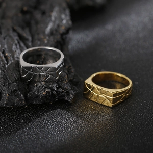 Men's vintage stainless steel rings with geometric patterns in gold and silver