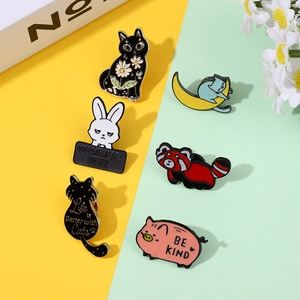 Cute animal enamel pins set featuring cat, rabbit, and red panda on a vibrant background