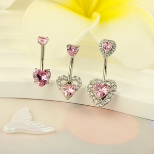 Three-piece set of silver belly rings featuring pink heart-shaped zircon gemstones