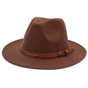 Detail of dark brown fedora hat showing leather band with metal buckle and contrast stitching