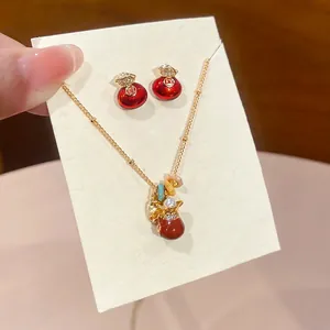 Gold plated zircon lucky bag jewelry set with red enamel necklace and earrings