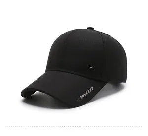 Detail view of black twill baseball cap showing RNVESEV logo and premium fabric texture