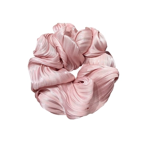 Lustrous light pink oversized pleated scrunchie with a satin finish and elastic band