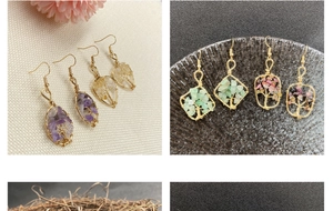 Detailed wire-wrapped tree of life earrings with natural crystal stones and gold hooks