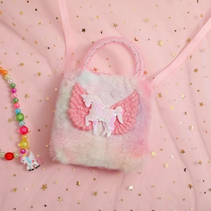 Detailed close-up of a pink plush unicorn toddler bag with sequins and beaded necklace
