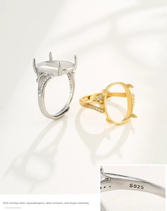 Macro detail of S925 sterling silver ring settings with CZ stones and four-prong mount