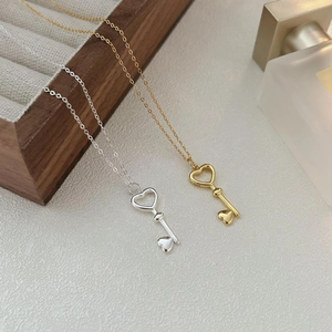 Elegant 925 sterling silver heart key necklaces in silver and gold minimalist tones