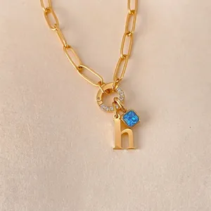 Elegante 14K vergulde roestvrijstalen armband met h-letter en schitterend blauw kristal
