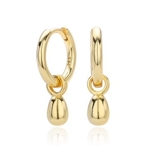 Macro shot of S925 sterling silver stamp on golden water drop earrings detail