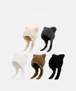 Detailed view of plush cat-ear knitted hats in five colors with functional ear flaps
