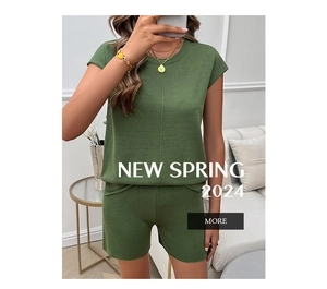 Detail view of olive green two-piece knitted set featuring sleeveless top and shorts